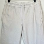 No Boundaries  Off White Jogger Pants with Subtle Butterfly Design - Medium Photo 3