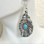 Silver tone feather and faux turquoise earrings Photo 1