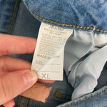 EUC Women’s medium/light wash blue stretch flare leg distressed‎ hem jeans XL Photo 5