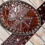 New brown textured belt with cute Celtic design buckle. Brown Photo 1