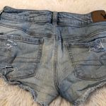 American Eagle  Distressed Lace Pocket Jean Shorts Photo 3
