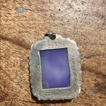 None sterling silver pendant with a rectangular moonstone ornate bezel setting. Photo 1