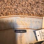 American Eagle Super Stretch Hi Rise Distressed Color Block Skinny Jeans Women's Photo 1