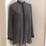 Sheer gray tunic top with black trim Photo 1