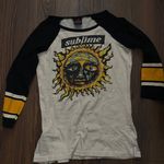 beige and black sublime shirt Photo 0