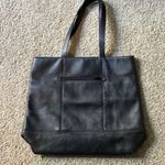 Tumi leather purse Photo 1