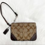 Coach brown logo print wristlet Photo 1