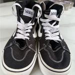 Vans  Classic Black and White High-Tops Photo 3