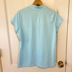 Nike golf Dri fit light blue activewear shirt Photo 1