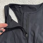 Gymshark  non stop sports bra black size medium size pocket zips front clasps bck Photo 4