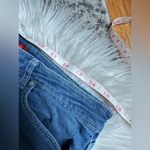 Jennifer Lopez high waisted denim capris Photo 9