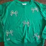 Lilly Pulitzer  Holiday Ballad Cotton Green Sweatshirt Silver Bow Embellishment Photo 0