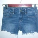 American Eagle  Shortie 0 25 Mid Rise Dark Wash Raw Hem Jeans Shorts Photo 0