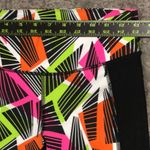 Fabletics tribal penzy print capri legging jogger in neon orange, pink and green Photo 5