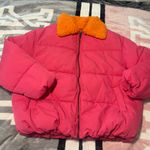 Urban Outfitters  Vibrant Pink Puffer with Bold Orange Collar Photo 0