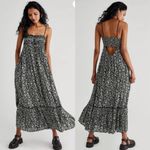 Free People  Molly Jo Midi Dress in a black floral print Photo 1