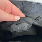 Nine West solid black shoulder crossbody tote purse with attached keychain Photo 6