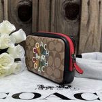 Coach CARRIER PHONE CROSSBODY IN SIGNATURE CANVAS WITH  RADIAL RAINBOW c6… Photo 1