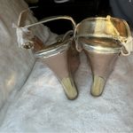 Bamboo Elegant  heeled sandals in metallic gold and silver tones. Photo 1