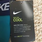 Nike Pro woman’s size XS teal and navy shorts Photo 8