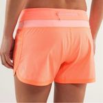 Lululemon Groovy Run Short Wagon Stripe Pop Orange / Bleached Coral size 10 Photo 1