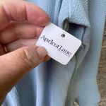 JODIFL NWT  size L faux wrap deep V blouson bell sleeves top. Photo 3