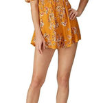 Flynn Skye Justine Romper Women's Small Orange Floral Puff Sleeve Smocked RTR Photo 0