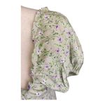 Motel -LIGHT GREEN FLORAL CROP TOP-SIZE MEDIUM Adorable green crop top with little purple flowers, side zipper, puff sleeves, size medium, excellent condition  Measurements: Bust: armpit to armpit 17 inches  Length: shoulder seam to bottom 16 inches Photo 2