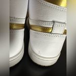 Nike White and Metallic Gold Air Jordan 1 Retro Sneakers Photo 7