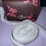 Coach 🩷 Mini Wallet On a Chain - CZ019 Merlot Coated Canvas w/Pink Bow Print NWT Photo 1