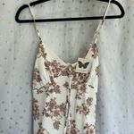 No Comment Chic White Maxi Dress with Brown Floral Design Photo 1