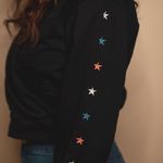 Le lis Embellished Stars Long Sleeve Faux Wrap V-Neck Crop Sweatshirt in Black Photo 2