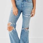 American Eagle AE Next Level Ripped Super High Waisted Flare Jean 2 Regular Blue Photo 0