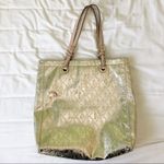 Michael Kors gold metalic tote bag and wallet set Photo 1
