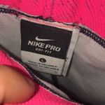 Nike pro leggings pink and purple leggings size large Photo 4