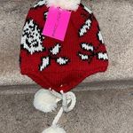 Betsey Johnson NWT winter knit hat in red and white with hanging pompoms. Photo 0