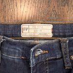 Free People  Dark Blue Distressed Denim Jeans Photo 1