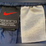 Nike  Women’s Size Medium (8-10) Navy Nylon Jogging Shorts‎ With Accent Stripes Photo 3