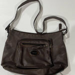 Jaclyn Smith  brown handbag Photo 0