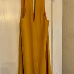 Lulus  Groove Thing golden yellow swing dress with a mock neck and front cutout Photo 3