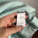 Peloton  teal crew neck sweatshirt Photo 1