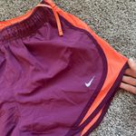 Nike  Women's Vibrant Purple and Orange Athletic Shorts Photo 3