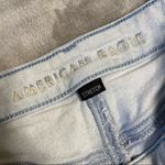 American Eagle stretch women’s light wash size 00 long distressed jeans pants Photo 2
