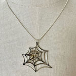 Two tone spider web pendant necklace Silver Photo 0