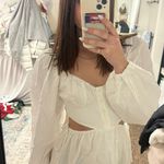 Sabo Skirt Sabo Cutout Long Sleeve Mini Dress Photo 1