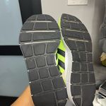 Adidas Neon Green Athletic Shoes with Black Stripes Photo 7
