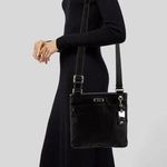 Tumi nylon crossbody bag in black I think it’s the voyager Photo 0