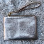 Francesca's Francesca’s Rose Gold Clutch Wristlet Photo 0