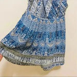 ⭐️ New with tags timing Francesca’s blue printed spaghetti strap romper Size M Photo 3