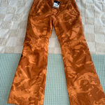 The North Face NWT  Women's Sally Insulated Pants in orange
Size Small Photo 0